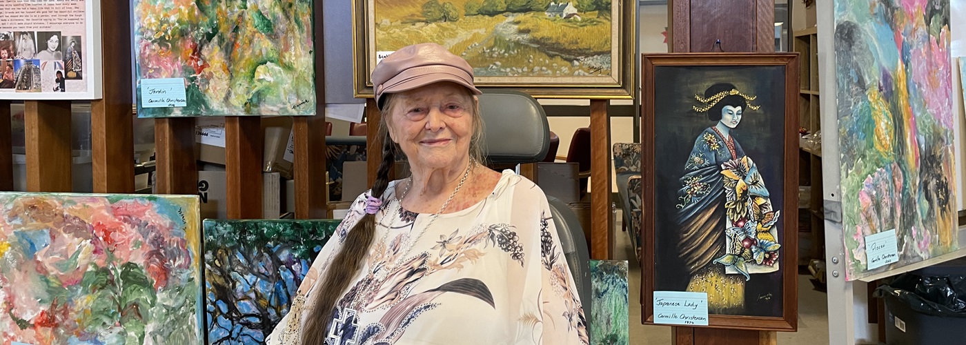 Carmille and her paintings.jpg