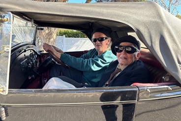 James going for a ride in a hot rod with owner Bruce_.jpg