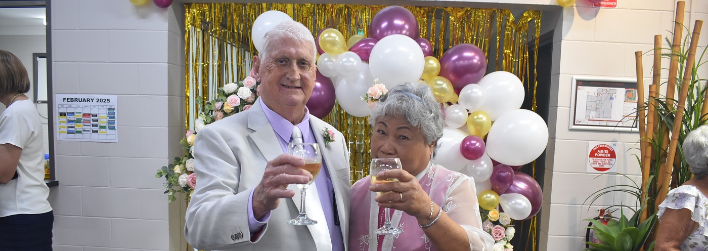 Neville and Fely on their wedding day.jpg